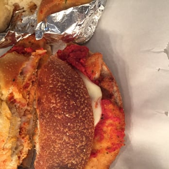 Rosa's Pizza - Chicken parm garlic knot panini.  Could have used more sauce BUT they give you extra on the side and with that extra sauce it is amazing. - Pizza Near Me - Maspeth, New York