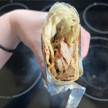 Wame Shawarma - Can't see well but this shows the cutting of tin foil and some of those fragmanets - Middle Eastern Near Me - Collegeville, Pennsylvania Wame Shawarma - Can't see well but this shows the cutting of tin foil and some of those fragmanets - Middle Eastern Near Me - Collegeville, Pennsylvania
