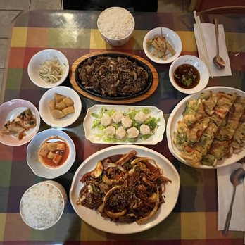 Arirang Korea Restaurant - Top: Beef Bolgolgi Middle: Shumai Bottom: Spicy Squid Right: seafood pancakes Price - was about $52 I believe. - Korean Near Me - Saint Paul, Minnesota Arirang Korea Restaurant - Top: Beef Bolgolgi Middle: Shumai Bottom: Spicy Squid Right: seafood pancakes Price - was about $52 I believe. - Korean Near Me - Saint Paul, Minnesota
