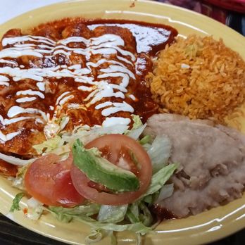 Sahuayo - Enchiladas with red salsa and sides (rice, refried beans and salad) - Mexican Near Me - Gonzales, Louisiana Sahuayo - Enchiladas with red salsa and sides (rice, refried beans and salad) - Mexican Near Me - Gonzales, Louisiana