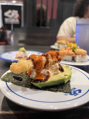 Kura Revolving Sushi Bar by null