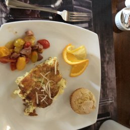 Baked egg soufflé with leeks & cheese, mini muffin & cherry tomatoes with sausage. Baked egg soufflé with leeks & cheese, mini muffin & cherry tomatoes with sausage.