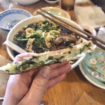 Lao Peng You - Inside of the green onion bread - Chinese Near Me - Chicago, Illinois Lao Peng You - Inside of the green onion bread - Chinese Near Me - Chicago, Illinois