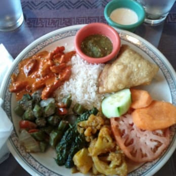 Everest Restaurant - Buffet plate...yummy Butter chicken and great curry chicken with a little spicy kick to it! - Indian Near Me - Longmont, Colorado Everest Restaurant - Buffet plate...yummy Butter chicken and great curry chicken with a little spicy kick to it! - Indian Near Me - Longmont, Colorado