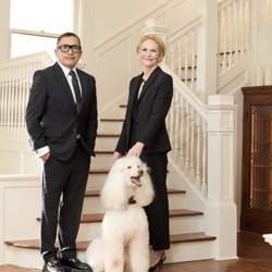 Carabin Law - Attorneys, David A. Tijerina and Kirsten Carabin with Boots.