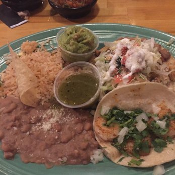 Miguel's Cantina - Combo 2 - tostada and fish taco (Mexican style taco). Side of guac costs extra. - Mexican Near Me - Rochester Hills, Michigan Miguel's Cantina - Combo 2 - tostada and fish taco (Mexican style taco). Side of guac costs extra. - Mexican Near Me - Rochester Hills, Michigan