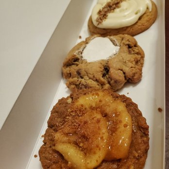 Crumbl - Wicker Park - Arrived right on time for some fire fall flavors! Bottom to top -- apple pie, smores, carrot cake, and double dark - Bakeries Near Me - Chicago, Illinois