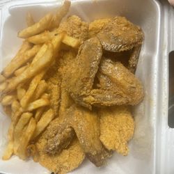 J & J Fish & Chicken - Combo: Fish and wings. It comes with fries.