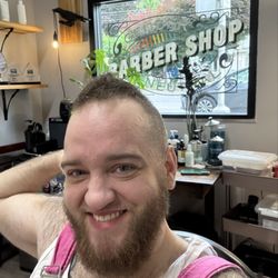 The Stone & Steel Barbershop - Jac shows off their fresh hair and beard trim during Pride weekend. Thanks Devi!