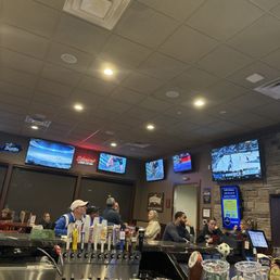people sitting at the bar people sitting at the bar