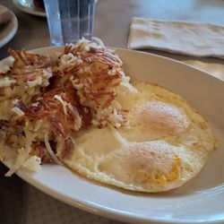 Andy's Restaurant - Two eggs over easy with hash browns.