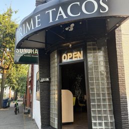 Exterior outside entrance of Sonora Carne Asada House - Street view - Seattle, Washington Exterior outside entrance of Sonora Carne Asada House - Street view - Seattle, Washington