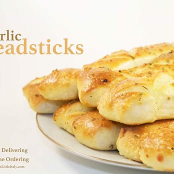 Dino's Little Italy - a plate of garlic breadsticks - Italian Near Me - Simpsonville, Kentucky Dino's Little Italy - a plate of garlic breadsticks - Italian Near Me - Simpsonville, Kentucky