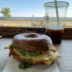 The Coffee District - Breakfast sandwhich with bacon & avocado. Cold brew!