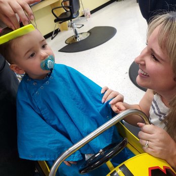 Cookie Cutters Haircuts for Kids - Watching tv (he needed the distraction) - Kids Hair Salons Near Me - Fullerton, California Cookie Cutters Haircuts for Kids - Watching tv (he needed the distraction) - Kids Hair Salons Near Me - Fullerton, California