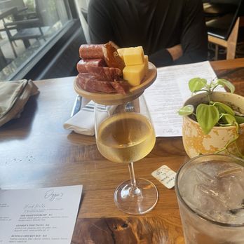 Oggie's Kitchen & Bar - pinot grigio w/ $5 charcuterie topper - Cocktail Bars Near Me - Milwaukee, Wisconsin