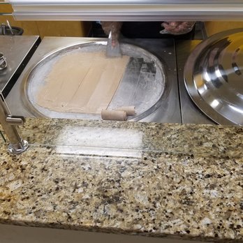 Curly Cream - Scraping ice cream and making the curls - Desserts Near Me - Daytona Beach, Florida Curly Cream - Scraping ice cream and making the curls - Desserts Near Me - Daytona Beach, Florida