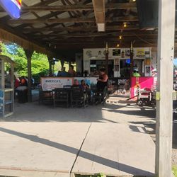 Open Air Bar - The bar from seating in the lawn