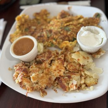 Eggcellence Cafe - El Paso Omelette with a side of fruits. - Waffles Near Me - Arlington Heights, Illinois