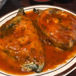 Poblanos Mexican Grill & Bar - The Chiles Poblanos ($9) were amazing - massive, lightly fried peppers, stuffed with gooey cheese and served with a thin tomato sauce.