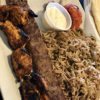 Kababchi Grill - Mix plate of Kofta Kabob and Chicken Tikka with Biryani a roasted tomato and a dash of garlic sauce! - Middle Eastern Near Me - San Antonio, Texas Kababchi Grill - Mix plate of Kofta Kabob and Chicken Tikka with Biryani a roasted tomato and a dash of garlic sauce! - Middle Eastern Near Me - San Antonio, Texas