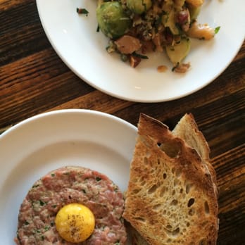 Lawrence - Steak tartare & smoked char + brussel sprouts. - Modern European Near Me - Montreal, Quebec