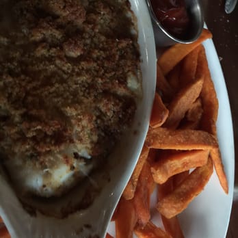 The Hardcover Restaurant - Baked haddock with sweet potato fries. - Steakhouses Near Me - Danvers, Massachusetts The Hardcover Restaurant - Baked haddock with sweet potato fries. - Steakhouses Near Me - Danvers, Massachusetts