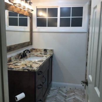 Cabinet Magic - Vanity lights, reclaimed barn wood framed mirror, granite counter, Kohler faucet, sink and toilet, Havana sugar cane tile - General Contractors Near Me - La Habra, California Cabinet Magic - Vanity lights, reclaimed barn wood framed mirror, granite counter, Kohler faucet, sink and toilet, Havana sugar cane tile - General Contractors Near Me - La Habra, California