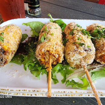 The Hub Baja Grill - Mexican street corn with Tajín. - Seafood Near Me - Sarasota, Florida The Hub Baja Grill - Mexican street corn with Tajín. - Seafood Near Me - Sarasota, Florida