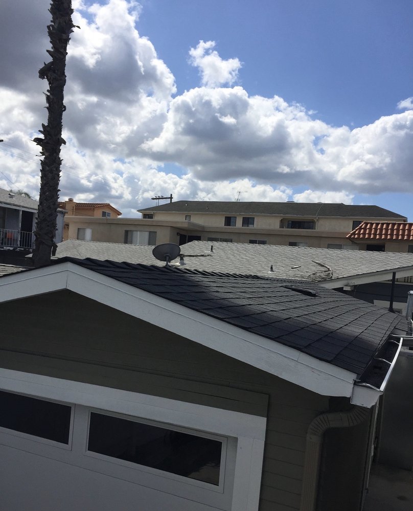 Slide of Ceus Roofing and Painting