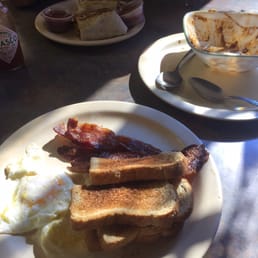 Eggs bacon n toast, smoked sausage burrito and an MT Frito Pie bowl! Nom Nom Eggs bacon n toast, smoked sausage burrito and an MT Frito Pie bowl! Nom Nom
