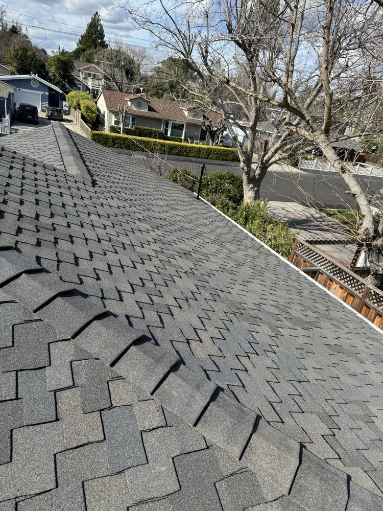 Slide of G West Roofing