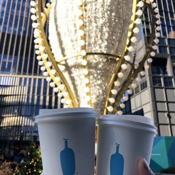Blue Bottle Coffee - Hudson Yards - two cups of coffee in front of the hudson yards - Coffee & Tea Near Me - New York, New York Blue Bottle Coffee - Hudson Yards - two cups of coffee in front of the hudson yards - Coffee & Tea Near Me - New York, New York