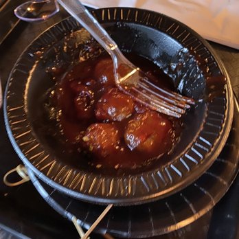 Debonné Vineyards - a plate of meatballs with a fork - Beer, Wine & Spirits Near Me - Madison, Ohio