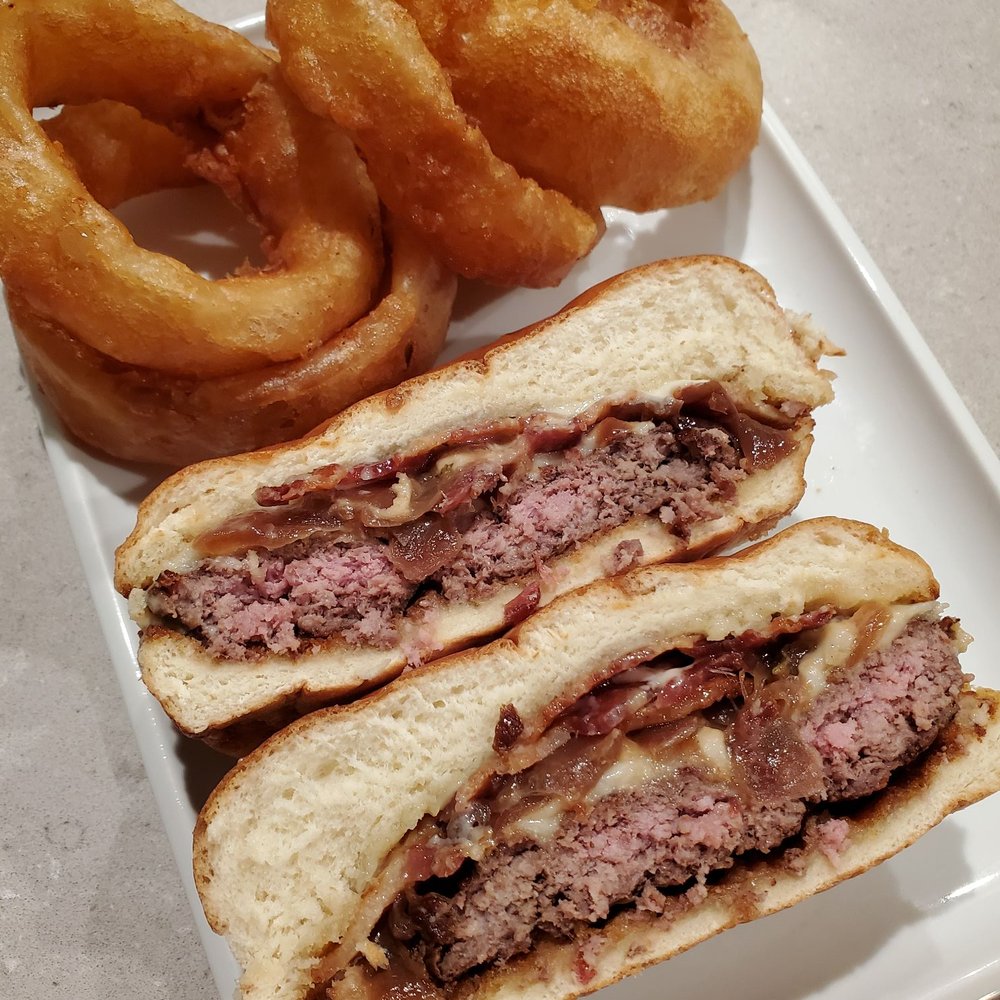 Uneeda Burger - Big Bison Burger ($15) and side of onion rings ($4) - Burgers Near Me - Seattle, Washington