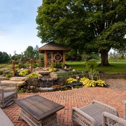 Redbud Development - Tea house with waterfall and brick patio