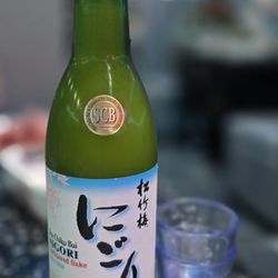 Ktown Korean BBQ Sushi and Hotpot - Unfiltered sake. complimentary token won from a previous birthday meal