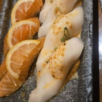 ITs SUSHI Southwest - Left: lemon salmon Right: super white One order comes with two pieces - Sushi Bars Near Me - Las Vegas, Nevada ITs SUSHI Southwest - Left: lemon salmon Right: super white One order comes with two pieces - Sushi Bars Near Me - Las Vegas, Nevada