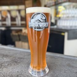 Isla Nu-Bar - Carib Brewery Isla Nublar IPA Beer (6.5% ABV; served in a collectible pilsner)