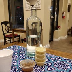 Pattay Khan - Why are the sauces presented in takeout containers?