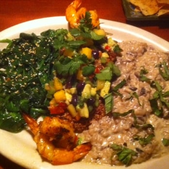 Mezza Grille - Pecan crusted salmon with shrimp, sauteed spinach salad and mushroom risotto - Mediterranean Near Me - Houston, Texas