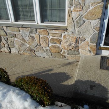 G & M Landscaping - a house with a stone wall and a fire hydrant - Landscaping Near Me G & M Landscaping - a house with a stone wall and a fire hydrant - Landscaping Near Me