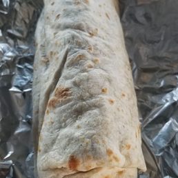 Regular beef burrito, was packed with beef and veges! Huge and delicious! Regular beef burrito, was packed with beef and veges! Huge and delicious!
