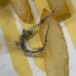 McDonald's - Extra surprise with fries.  Shrugged off by shift manager.  Disappointed with quality.  Won't be back.