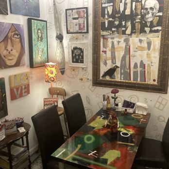 Arts & Eats Café - Some tables surrounded by art work - Cafes Near Me - Fort Myers, Florida