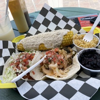 The Taco Joint - Salmon and shrimp tacos. Black beans and rice and corn on the cob - Tacos Near Me - Hollywood, Florida The Taco Joint - Salmon and shrimp tacos. Black beans and rice and corn on the cob - Tacos Near Me - Hollywood, Florida
