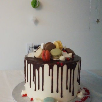 Artzy Custom Cakes - a chocolate drip cake - Custom Cakes Near Me Artzy Custom Cakes - a chocolate drip cake - Custom Cakes Near Me