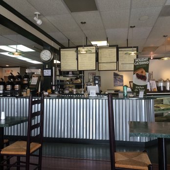 Kitchen On Trent - a restaurant counter with a clock on the wall - Breakfast & Brunch Near Me - New Bern, North Carolina