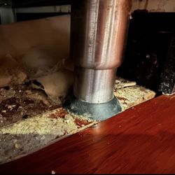 SERVPRO of Ozone Park/Jamaica Bay - Unsafe positioning of a stove as left by Servpro. Nails protruding from wood slab.