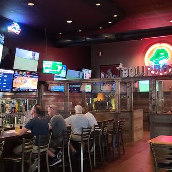 Winking Lizard Tavern - people sitting at the bar - American Near Me - Canton, Ohio Winking Lizard Tavern - people sitting at the bar - American Near Me - Canton, Ohio